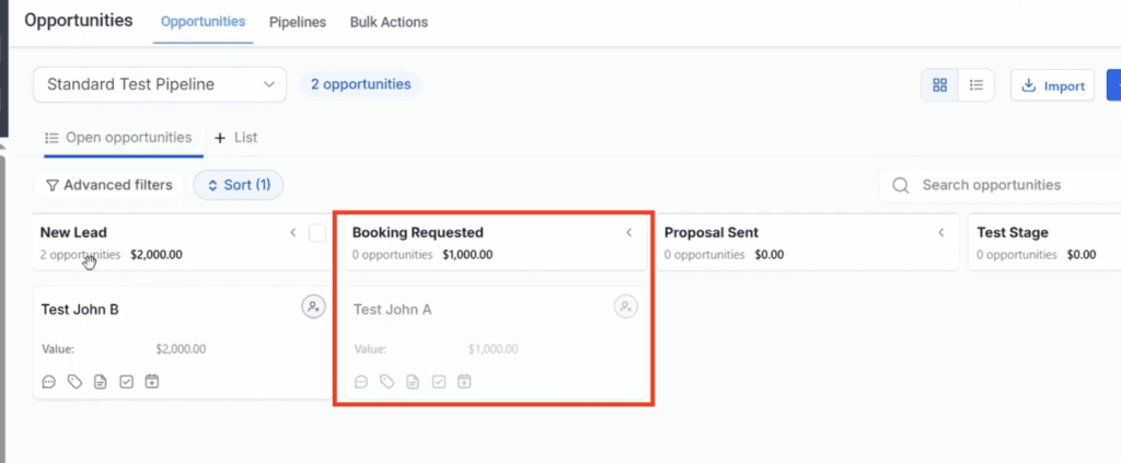 Dragging an opportunity card to a new stage in a GoHighLevel pipeline.